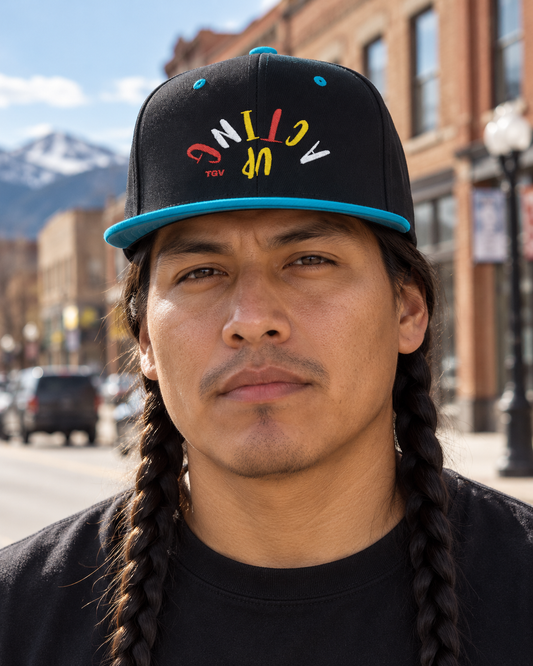AI-generated lifestyle portrait showing the black and turquoise Acting Up embroidered snapback on a braided male model.