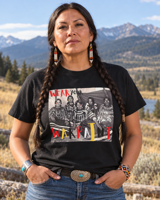 AI-generated lifestyle image of Blackfoot Women "Wear Your WarPaint" Unisex T-Shirt by Teague WestWolf GoodVoice (Blackfoot / Blackfeet Tribe - Browning, Montana) Native American Indigenous Made.Unisex Heavy Cotton Tee