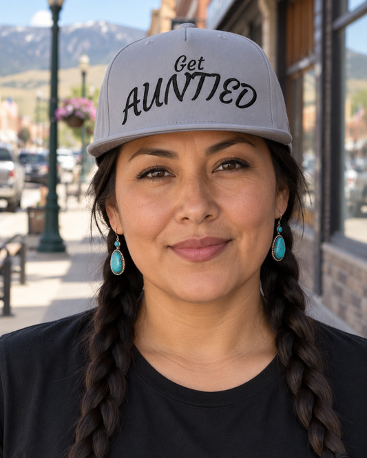 AI-generated lifestyle image of Flat Bill Cap — "Get Auntied" Embroidered Snapback Hat